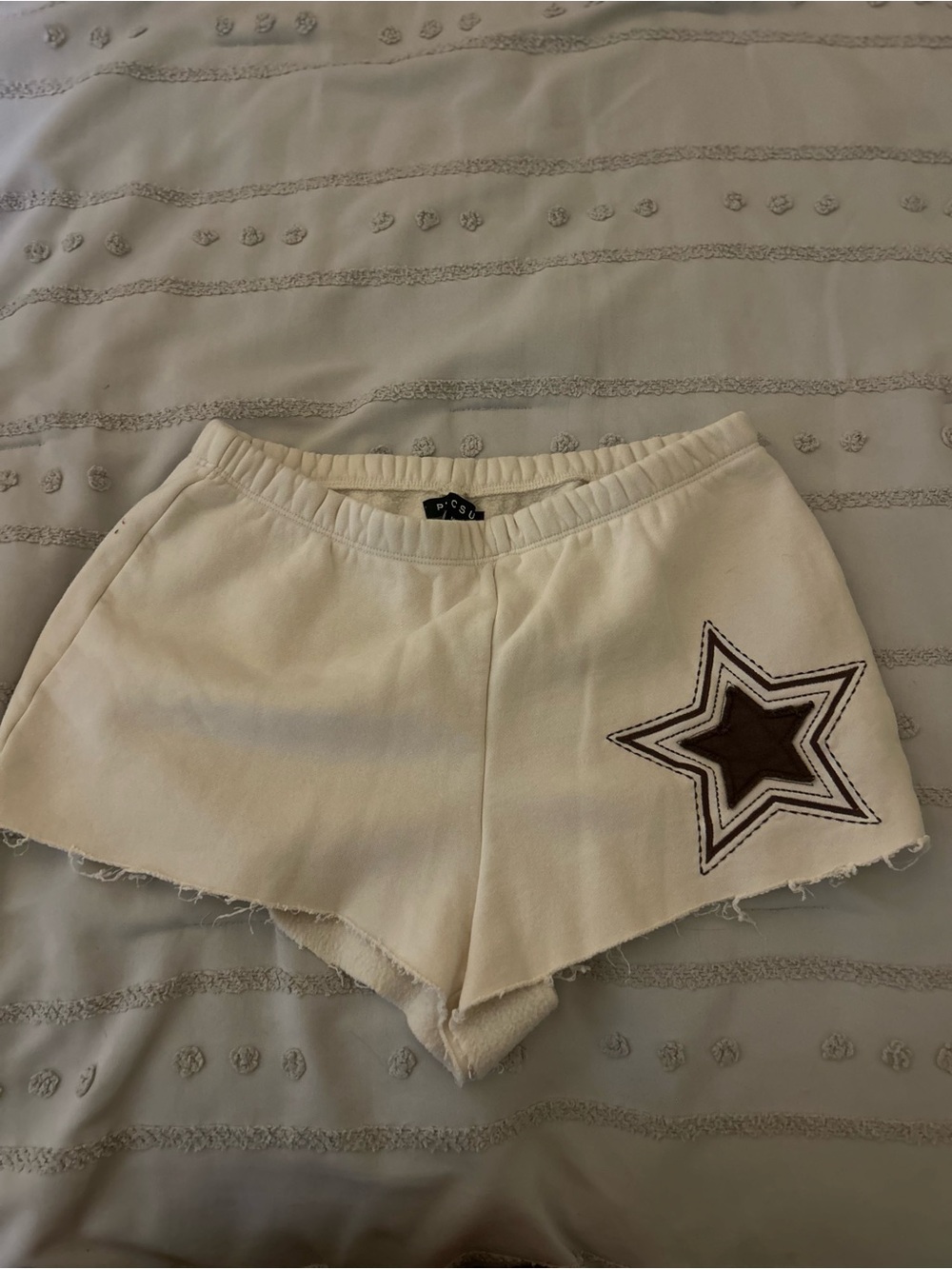 PacSun Cream Shorts with Brown Star Patch